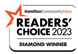 A red star with the words hamilton community news readers choice 2 0 2 1 diamond winner.